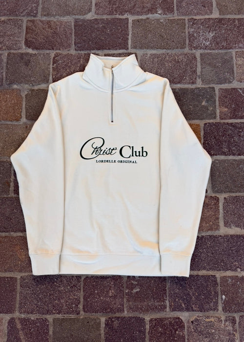 White hoodie with 'Crest Club' logo on a brick background