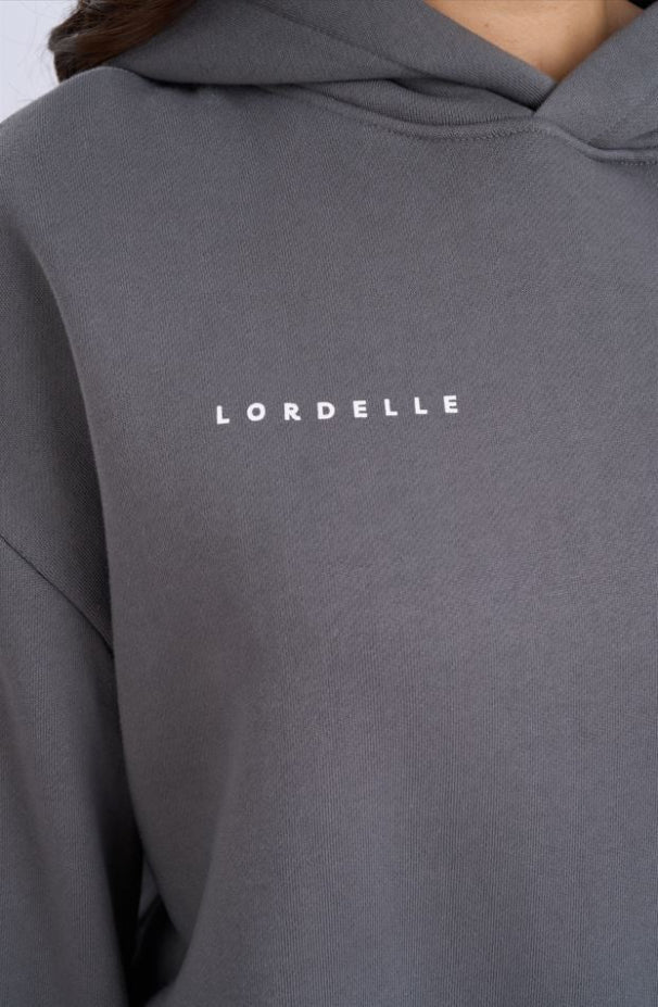 Grey hoodie with 'LORDELLE' logo on a plain background